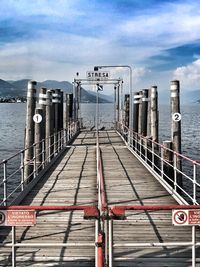 Pier on sea against sky