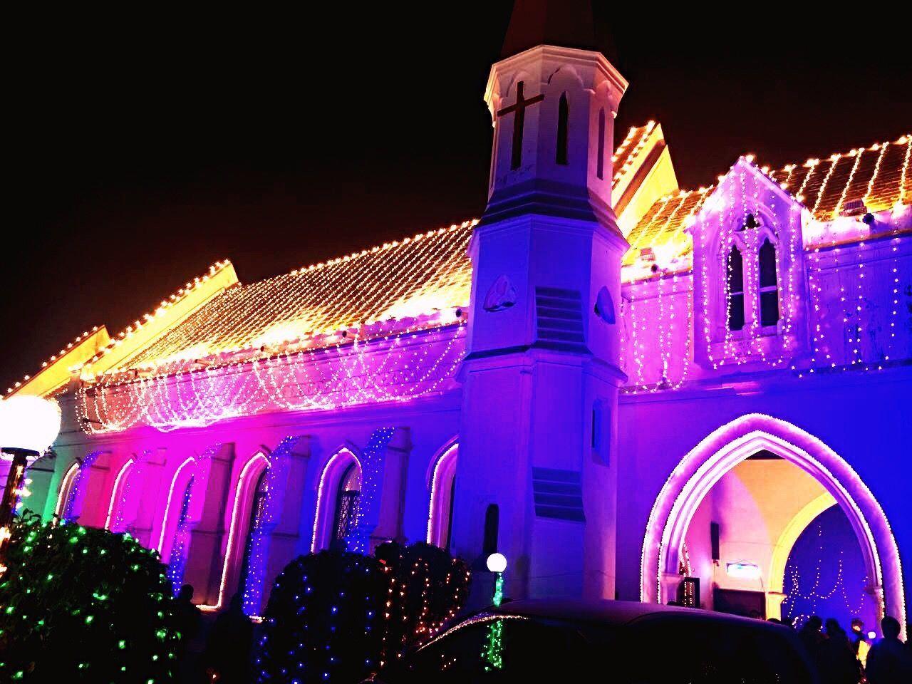 LOW ANGLE VIEW OF ILLUMINATED BUILDING