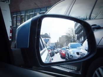 View of cars in parking lot