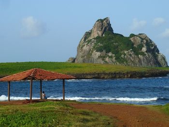 Scenic view of landscape against cloudy sky