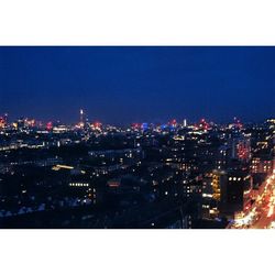 Illuminated cityscape at night