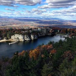 High angle shot of lake along countryside landscape