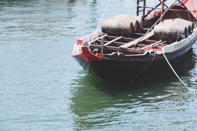 Boat moored on river