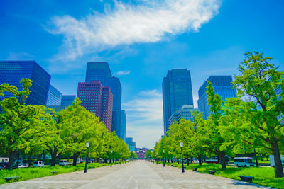 Buildings in city against sky