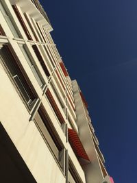 Low angle view of modern building against clear sky