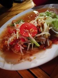 Close-up of served food in plate