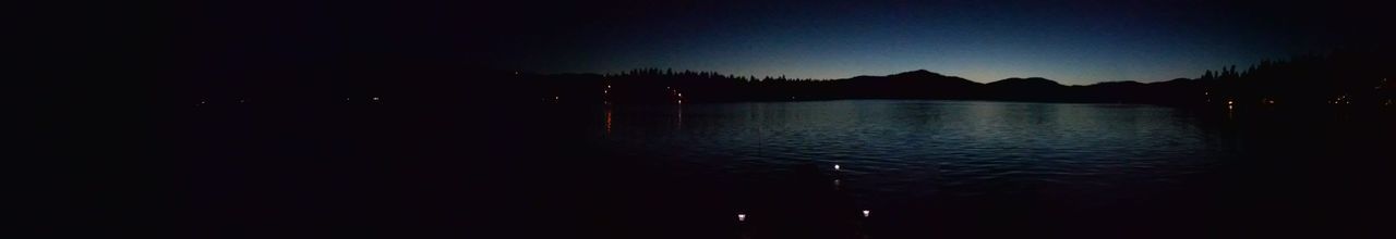 Reflection of trees in calm lake