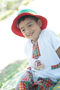 Portrait of smiling boy wearing hat