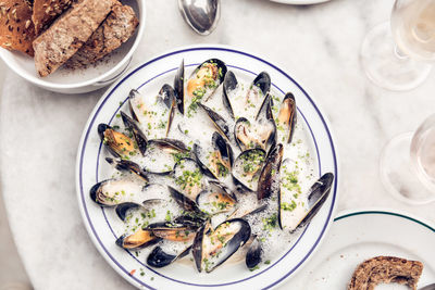 Close-up of clams in plate on table