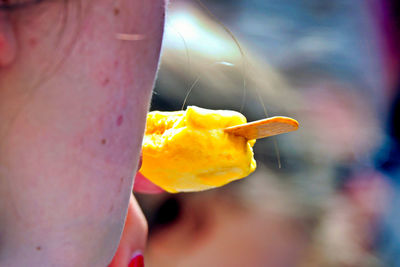 Close-up of woman holding ice cream