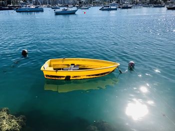 High angle view of man floating on sea