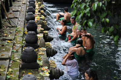 Group of people enjoying in water