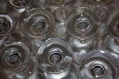 Upside down wineglasses arranged on table