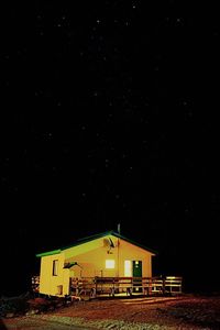 House against sky at night