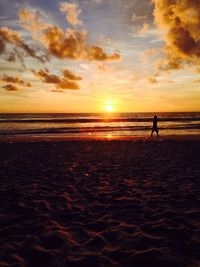 Scenic view of sea at sunset