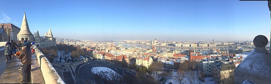 High angle view of city buildings against sky