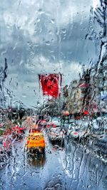 Water drops on car windshield during rainy season