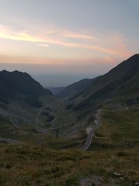 Scenic view of mountains against sky during sunset