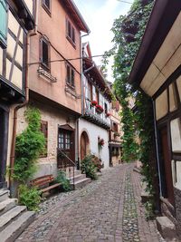 Alley amidst buildings in city