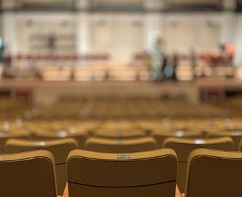 Empty chairs in stadium