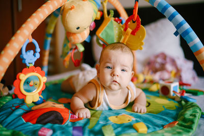 Close-up portrait of cute baby toys