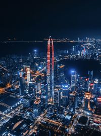 High angle view of illuminated buildings in city at night