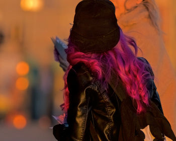 Close-up of woman wearing hat