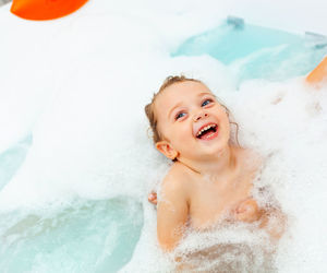 High angle view of girl in bathtub