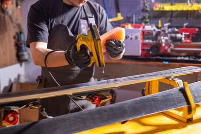 Man working on metal structure