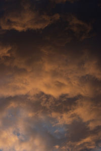 Low angle view of dramatic sky during sunset