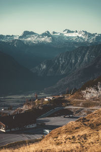 Scenic view of snowcapped mountains against sky