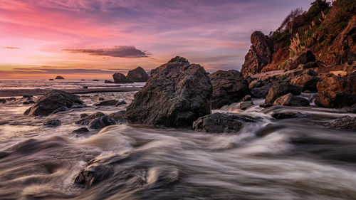 Scenic view of sea against sky during sunset