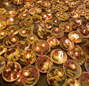 Full frame shot of illuminated candles