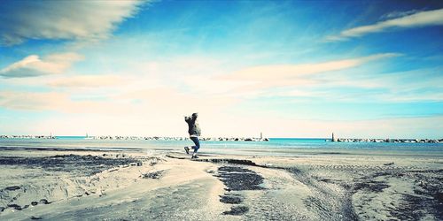 Scenic view of beach against sky