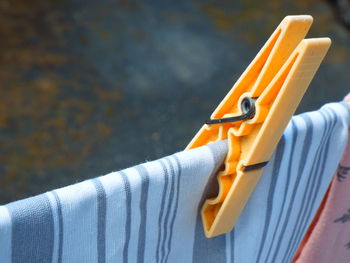 Close-up of clothes drying on clothesline