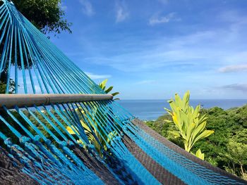 Scenic view of sea against blue sky