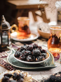 Kurma aja or ajwa dates fruits on the table. one of sunnah foods for iftar breakfasting