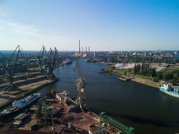 Panoramic view of river and buildings against sky