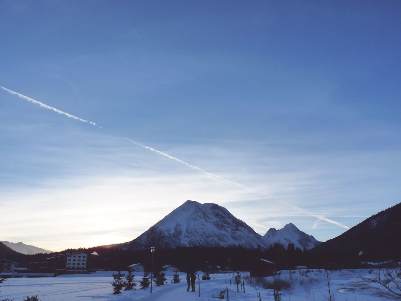 snow, winter, cold temperature, scenics, nature, beauty in nature, snowcapped mountain, tranquility, mountain, sky, tranquil scene, blue, landscape, outdoors, mountain range, day, no people, vapor trail