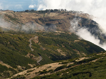 Scenic view of land against sky