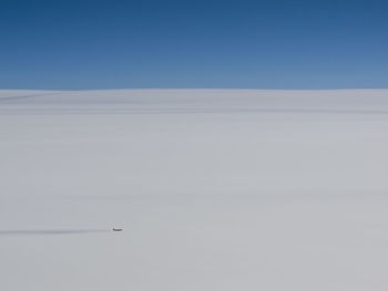 Scenic view of landscape against clear blue sky