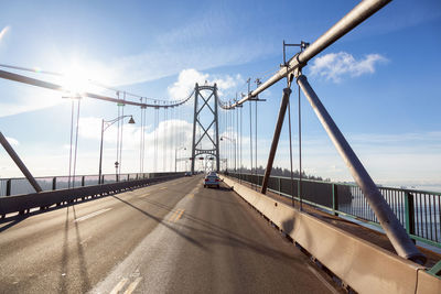 View of suspension bridge against sky