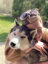 Portrait of dog and woman