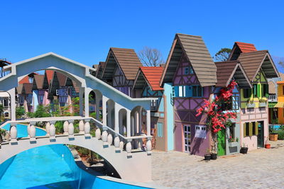 View of swimming pool against buildings