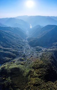 Aerial view of landscape and mountains against sky