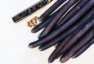 High angle view of carrots on white background