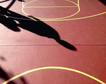 High angle view of shadow on the road