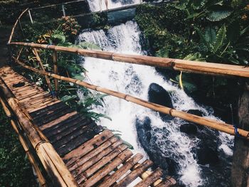 High angle view of wooden log in water