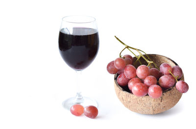 Close-up of fruits against white background