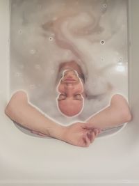 Portrait of woman in bathtub